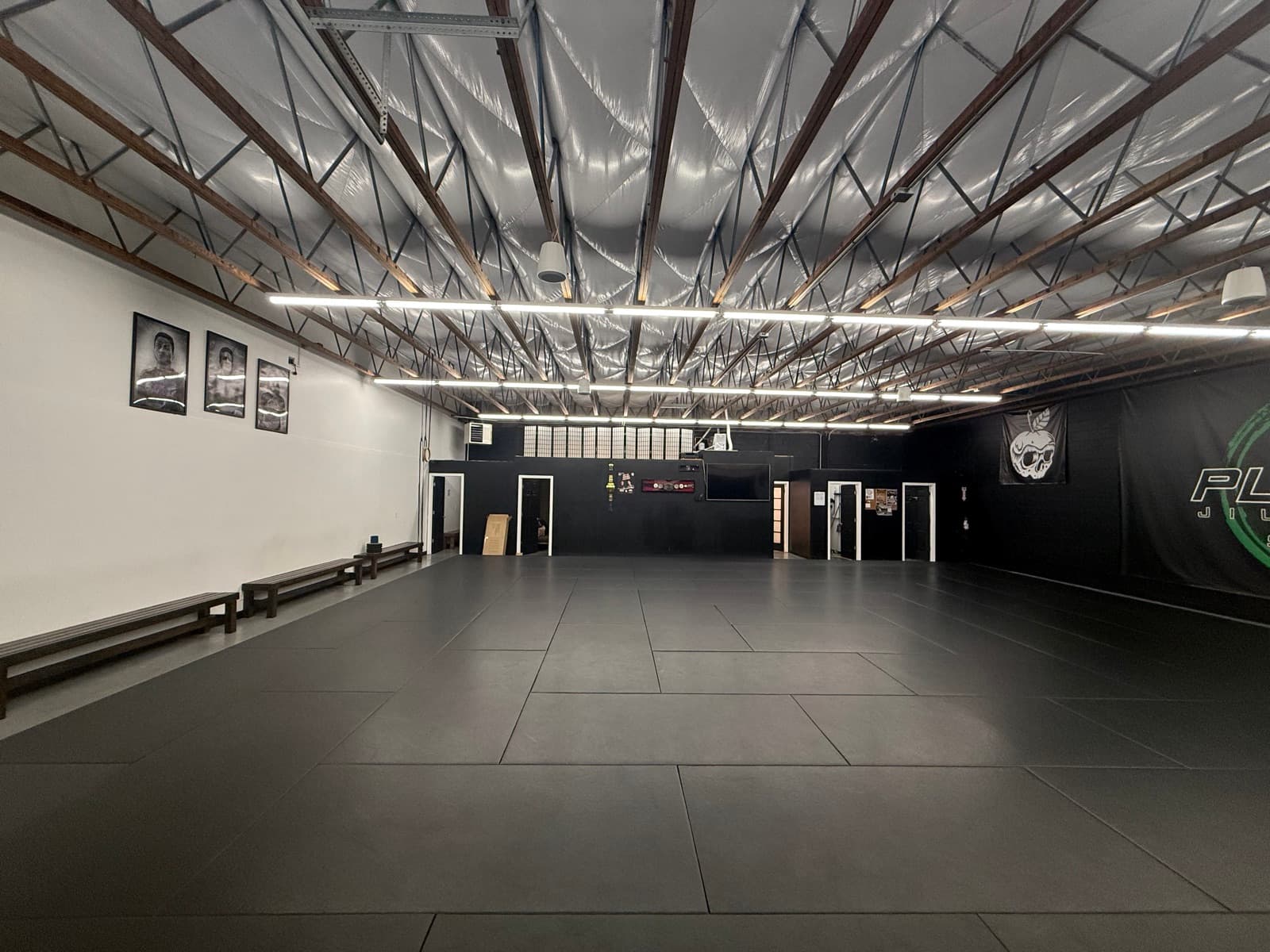 Inside the 10th Planet Seattle academy in Bellevue, WA — clean mats, full training space.