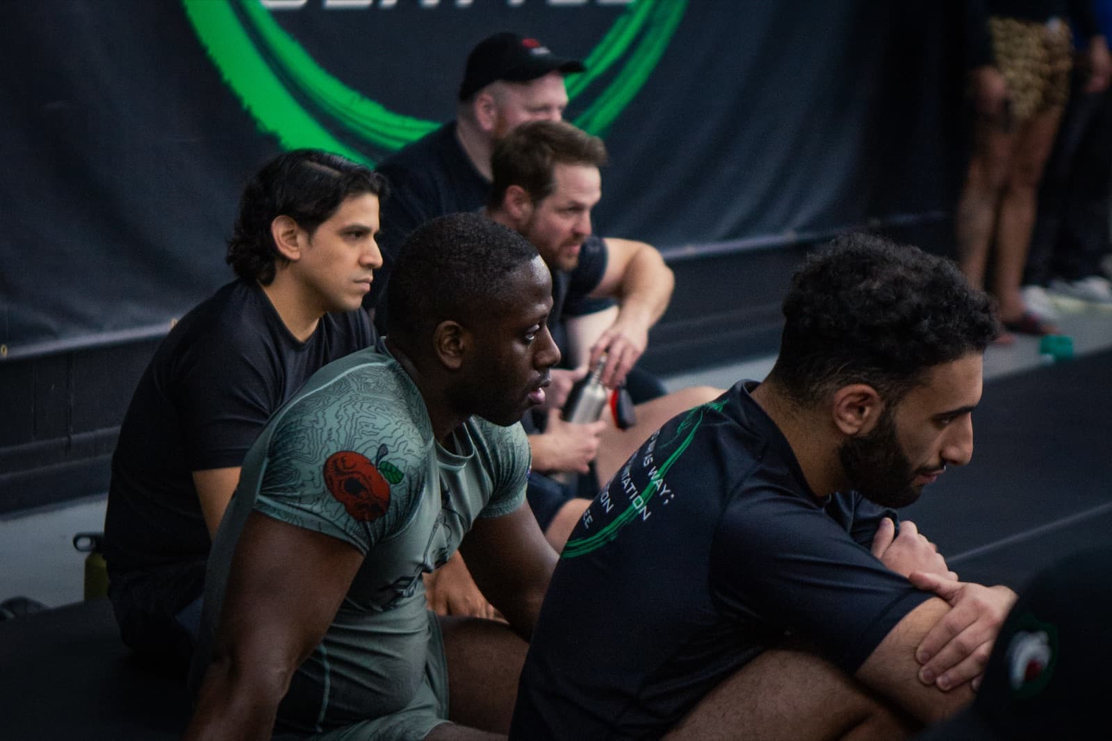 10th Planet Seattle athletes drilling no-gi positions on the mats.